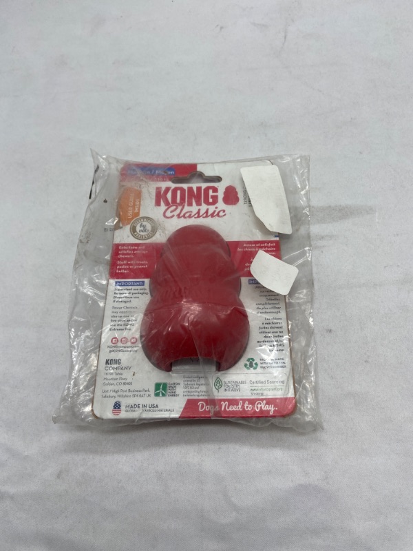 Photo 3 of KONG - Classic Dog Toy, Durable Natural Rubber- Fun to Chew, Chase and Fetch - for Medium Dogs
