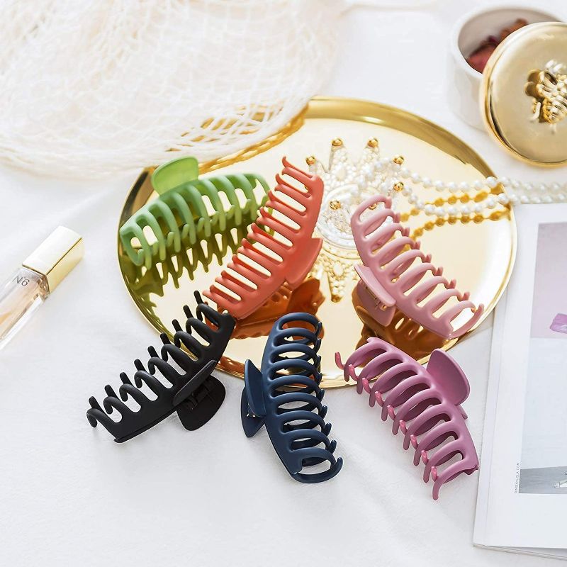 Photo 2 of Large Big Hair Claw Clips Non-slip 4.3 Inch Big Banana Hair Claw Clips for Women Girls , Strong Hold clips for Thick Thin Hair Barrettes for Long Hair, Fashion Accessories Hair Clamps Clip for Thick Heavy Hair Wigs 6 Color 12 Pack  (Black Purple Pink Gree