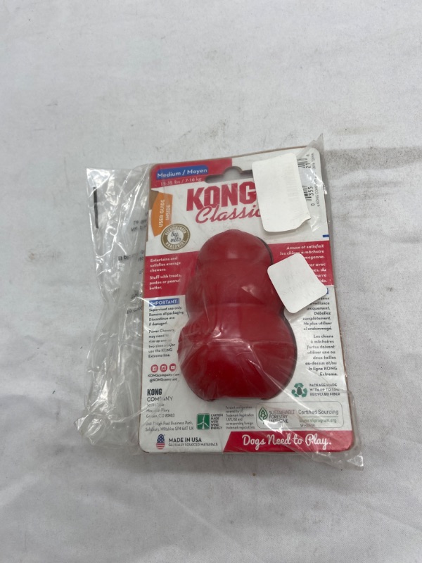 Photo 3 of KONG - Classic Dog Toy, Durable Natural Rubber- Fun to Chew, Chase and Fetch - for Medium Dogs
