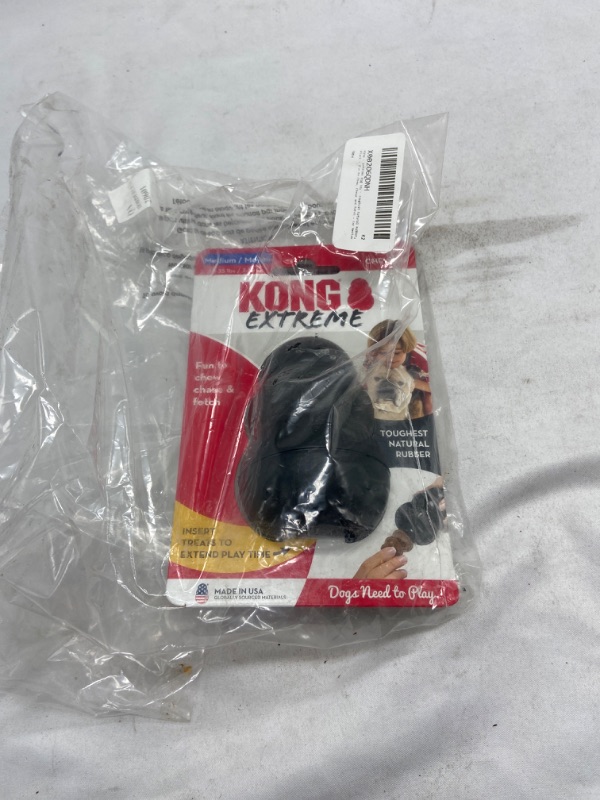 Photo 4 of KONG - Extreme Dog Toy - Toughest Natural Rubber, Black - Fun to Chew, Chase and Fetch - for Medium Dogs

