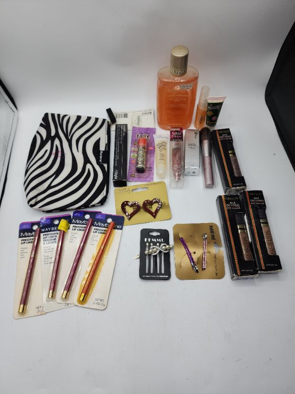 Photo 1 of Miscellaneous Variety Brand Name Cosmetics Including (( Ultima II, Bubble Yum, Naturistics, Maybelline, Femme, ItStyle, LipFix )) Including Discontinued Makeup Products