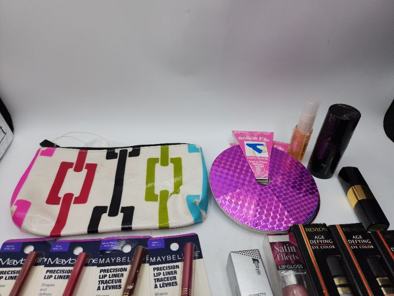 Photo 2 of Miscellaneous Variety Brand Name Cosmetics Including (( Sally Hansen, Naturistics, Revlon, Maybelline, Loreal, ItStyle, Vincent Longo )) Including Discontinued Makeup Products