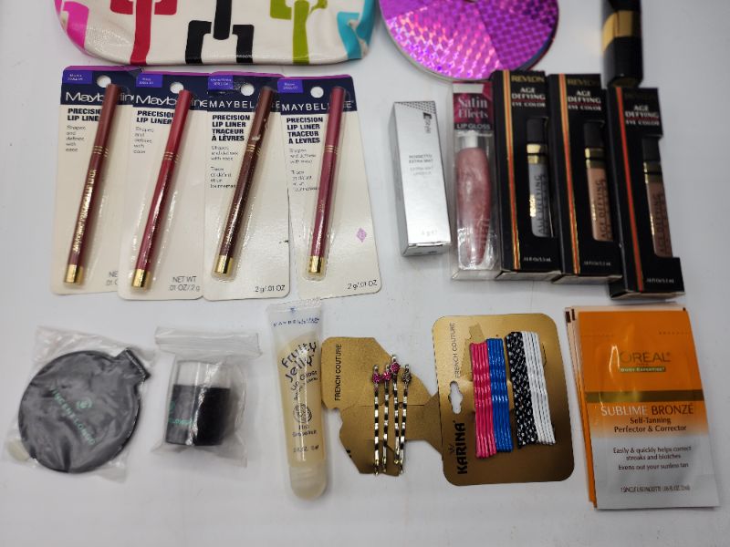 Photo 3 of Miscellaneous Variety Brand Name Cosmetics Including (( Sally Hansen, Naturistics, Revlon, Maybelline, Loreal, ItStyle, Vincent Longo )) Including Discontinued Makeup Products