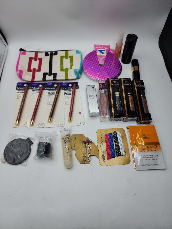 Photo 1 of Miscellaneous Variety Brand Name Cosmetics Including (( Sally Hansen, Naturistics, Revlon, Maybelline, Loreal, ItStyle, Vincent Longo )) Including Discontinued Makeup Products