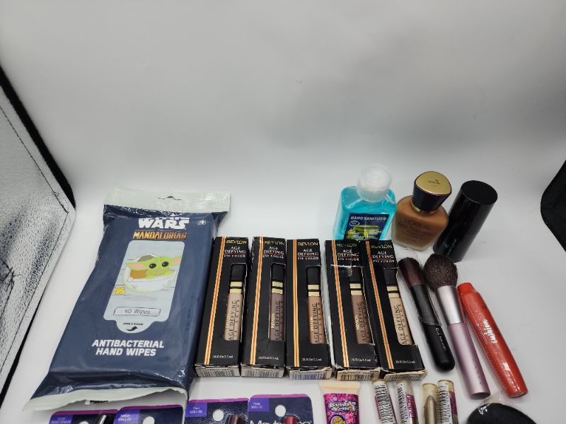 Photo 2 of Miscellaneous Variety Brand Name Cosmetics Including ((Maybelline, Bubble Yum, Loreal, Revlon, Femme, Karina Mally, Vincent Longo))  Including Discontinued Makeup Products
