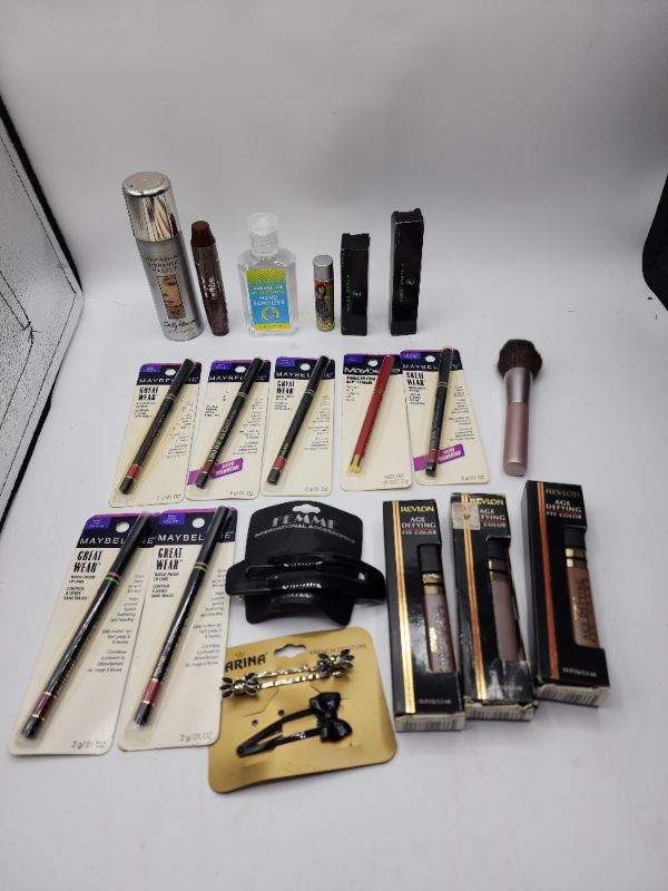 Photo 1 of Miscellaneous Variety Brand Name Cosmetics Including ((Maybelline, Sally Hansen, Revlon, Femme, Karina Mally, Vincent Longo))  Including Discontinued Makeup Products