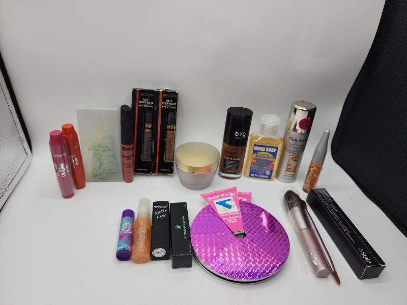 Photo 1 of Miscellaneous Variety Brand Name Cosmetics Including (( Revlon, Vincent Longo, ItStyle, Loreal, Naturistics,Cover Girl, Mally, Sally Hansen)) Including Discontinued Makeup Products