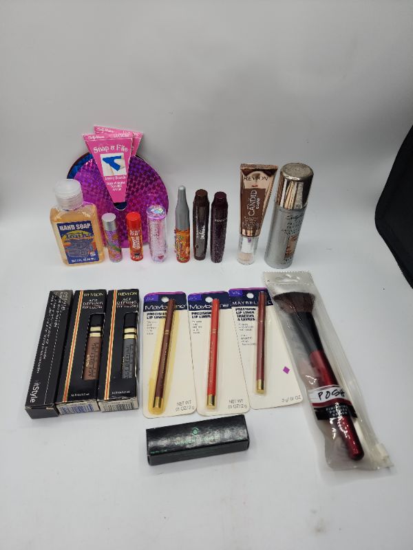 Photo 1 of Miscellaneous Variety Brand Name Cosmetics Including (( Maybelline, Posh, Revlon, Vincent Longo, ItStyle, Loreal, Naturistics, Blossom, Sally HAnsen)) Including Discontinued Makeup Products