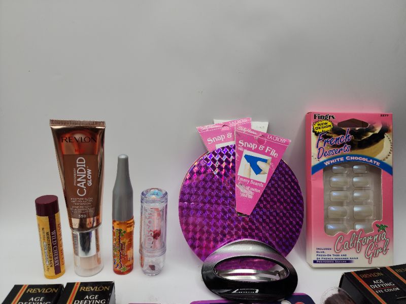 Photo 2 of Miscellaneous Variety Brand Name Cosmetics Including (( Maybelline, Revlon, Vincent Longo, Burt bees, Cabbots, Naturistics, Blossom, Karina)) Including Discontinued Makeup Products