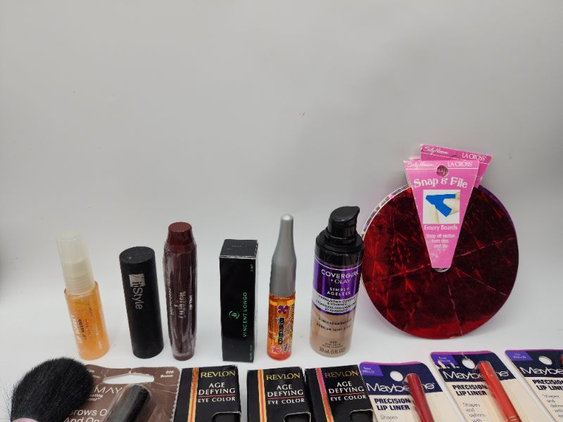 Photo 2 of Miscellaneous Variety Brand Name Cosmetics Including (( Revlon, Maybelline, Cover Girl, Mally, Almay, Bubble Yum, Naturistics, Sally Hansen, ItStyle, Vincent Longo)) Including Discontinued Makeup Products