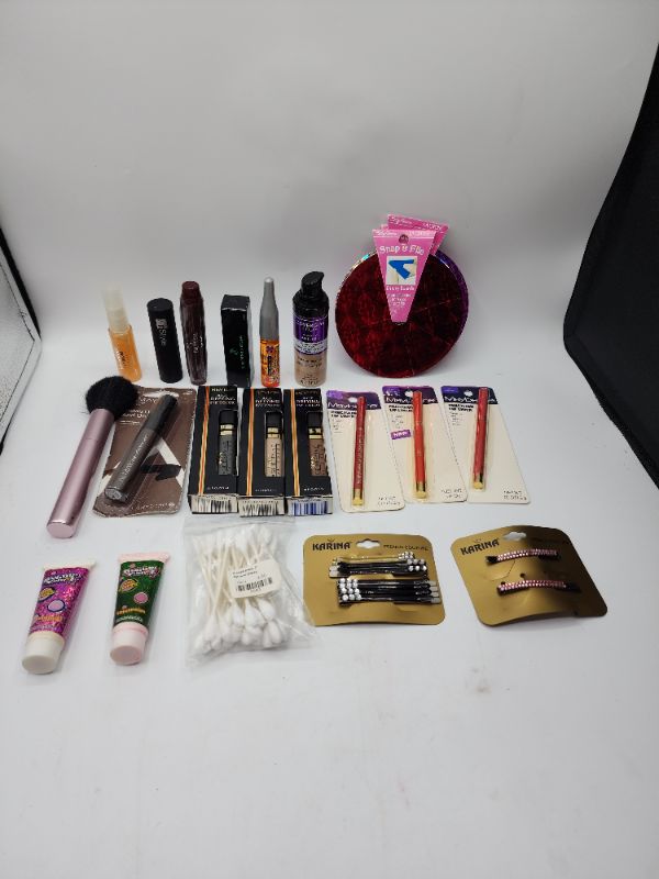 Photo 1 of Miscellaneous Variety Brand Name Cosmetics Including (( Revlon, Maybelline, Cover Girl, Mally, Almay, Bubble Yum, Naturistics, Sally Hansen, ItStyle, Vincent Longo)) Including Discontinued Makeup Products