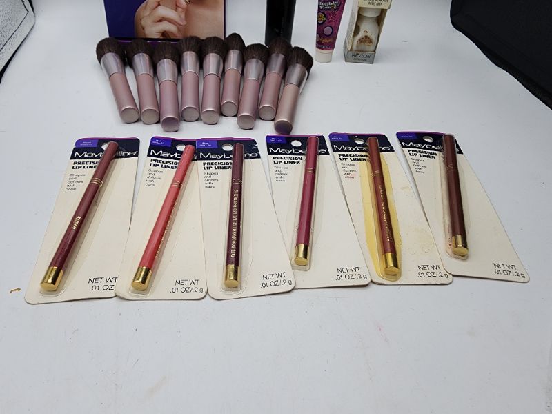 Photo 3 of Miscellaneous Variety Brand Name Cosmetics Including (( Maybelline, Bubble Yum, Mally, Vincent Longo, Kitcci))  Including Discontinued Makeup Products