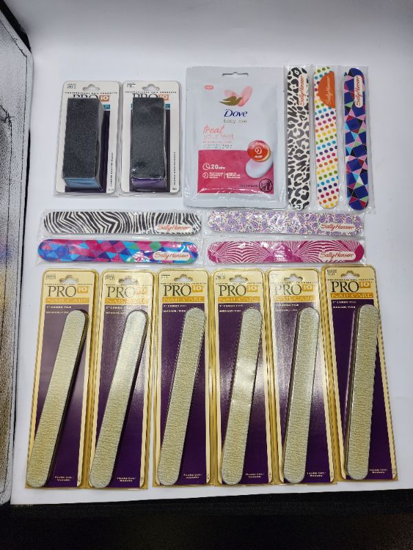 Photo 1 of  16 Pack Nail Items, 2 Buffers, 1 Foot Mask, 7 Regular Grit files, 6 Pro 10 Nail Files New 