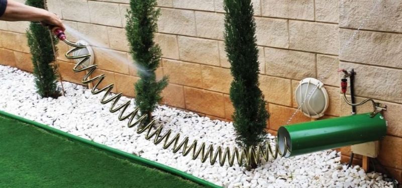 Photo 1 of 25 Foot Spiral Garden Hose With Canister Screws To Wall When Done Stands Up Right On Wall New 