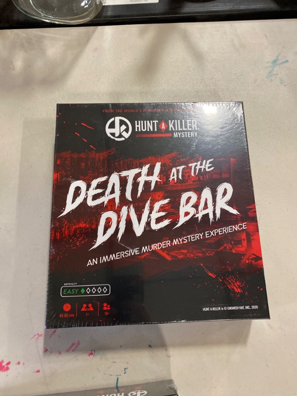 Photo 2 of Hunt A Killer Death at The Dive Bar - Solve The Murder of a Tavern Owner - for True Crime Fans with Documents & Puzzles - Murder Mystery Game for Adults - Solve Crimes at Game Night or Date Night Death at the Dive Bar Game
