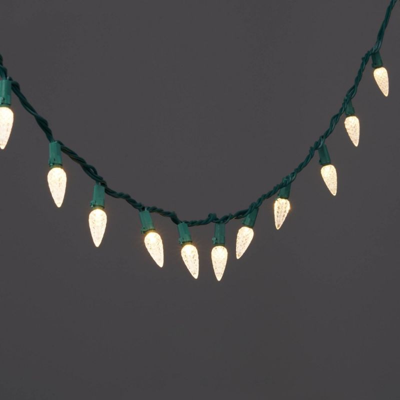 Photo 1 of 150ct LED C6 Faceted Christmas String Lights Warm White with Green Wire - Wondershop™