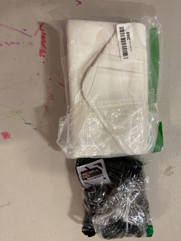 Photo 1 of 2 item bundle- sanabull 180 wraps, clutch purse white
