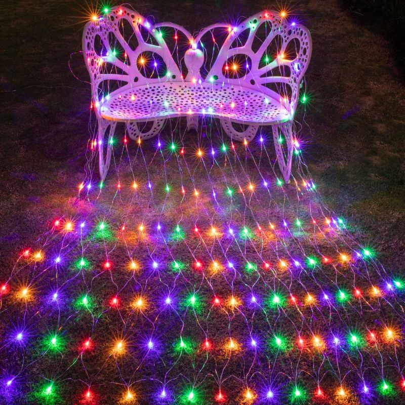 Photo 2 of AWQ 200 LED 9.8ft x 6.6ft String Lights Net Mesh Lights Christmas Net Lights 8 Modes for Christmas Wedding Party Home Garden Lawn Bushes Indoor Outdoor Decor (9.8ft x 6.6ft, Multicolor)
