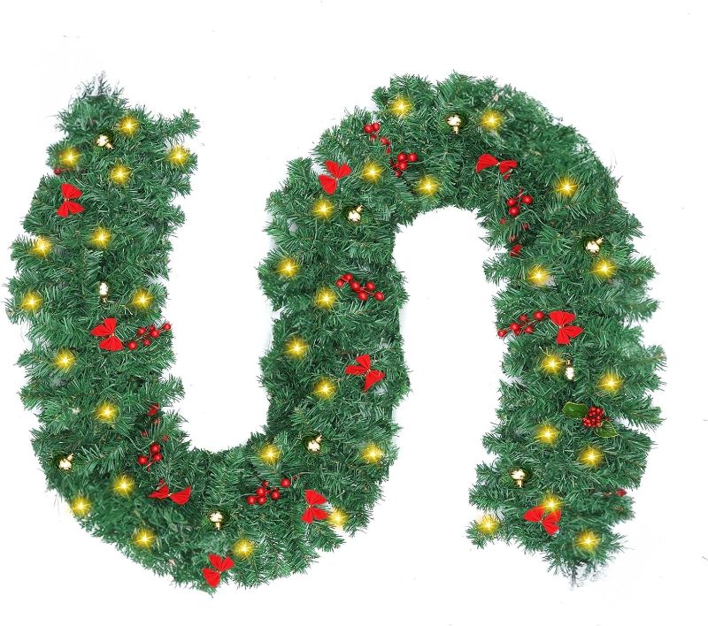 Photo 1 of Christmas Garland 9 FT 280 Branch 50 LED Red Berry Bows Dalliwow Christmas Garland with Lights Garlands for Indoor Outdoor Christmas Decorations for Mantel Stairs Winter Holiday Xmas Decor
