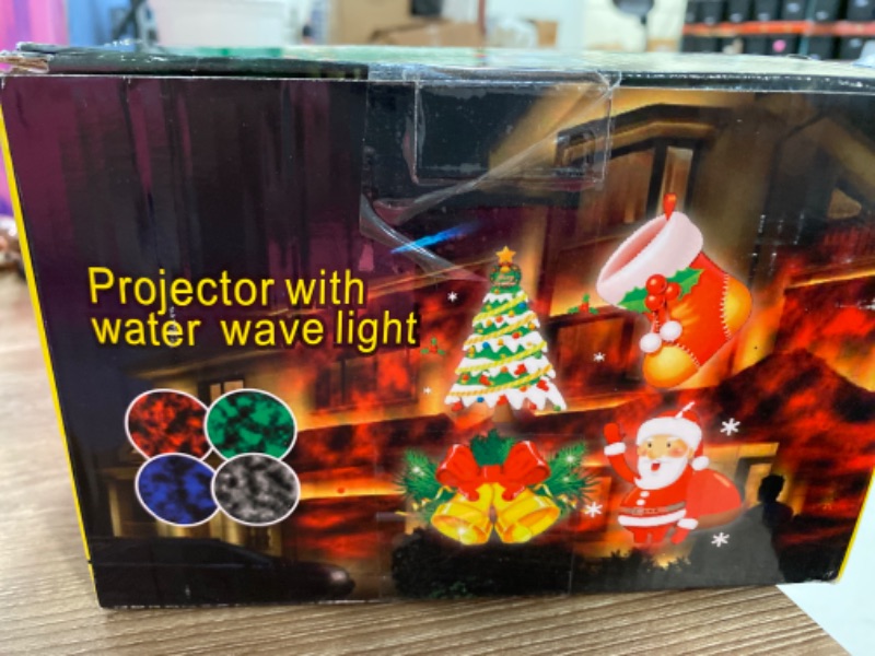 Photo 2 of Christmas Projector Lights, LED Projection Light, 2 in 1 Water Wave Projector Light with 16 Switchable Patterns,Waterproof Landscape Light Show for Celebration Halloween Birthday and Party Decoration
