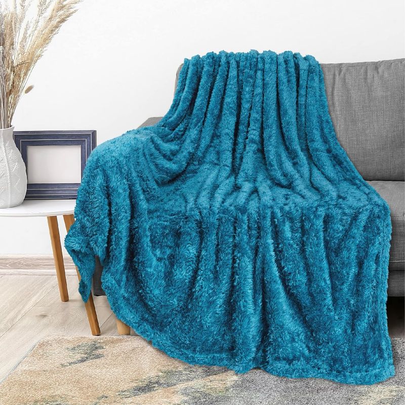 Photo 1 of PAVILIA Turquoise Blue Plush Throw Blanket for Couch, Sherpa Soft Cozy Blanket and Throw for Sofa Bed, Decorative Fur Fuzzy Warm Fleece Blanket, Lightweight Boho Home Decor All Season, 50x60
