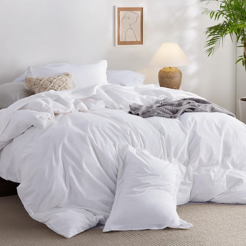 Photo 1 of Bedsure 100% Washed Cotton Duvet Cover Queen - Bright White Minimalist Duvet Cover Linen Like - 3 Pieces Plain Simple Cotton Duvet Cover Set with 2 Pillow Shams (Bright White, Queen, 90"x90")
