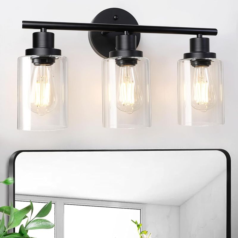 Photo 1 of Unicozin 3 Light Vanity Lights, Black Wall Sconce Light with Clear Glass, Bathroom Light Fixtures, Wall Lights for Mirror, Living Room, Bedroom, Hallway, E26 Base (Bulbs Not Included)
