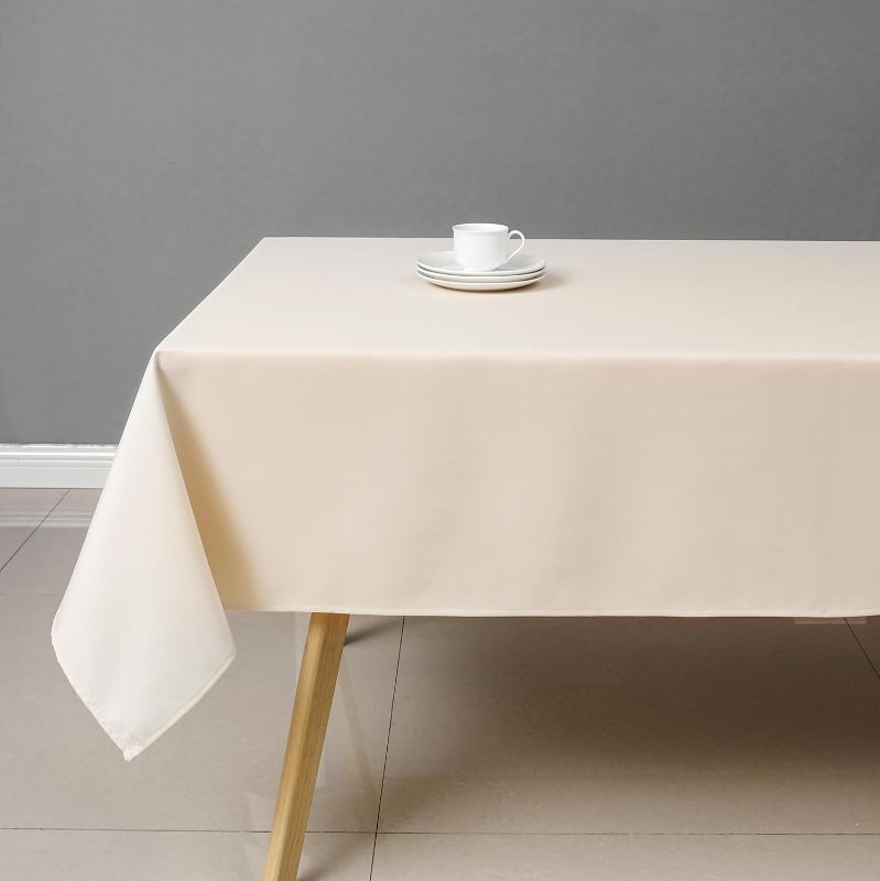 Photo 1 of Wewoch Beige Rectangle Tablecloth Wrinkle Resistant Washable Fabric Table Cloth for Dining,Kitchen, Parties Weddings and Outdoor Use 60 Inch by 84 Inch
