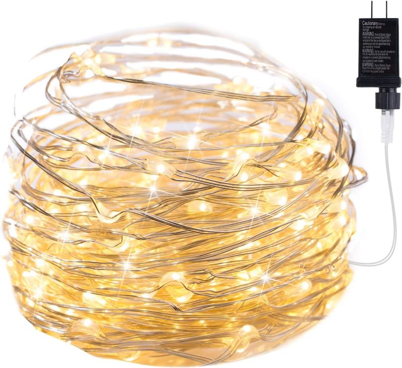 Photo 1 of Minetom Fairy Lights Plug in, 33Ft 100 LEDs Waterproof Silver Wire Firefly Lights, Adaptor Included, Starry String Lights for Wedding Indoor Outdoor Christmas Patio Garden Decoration, Warm White
