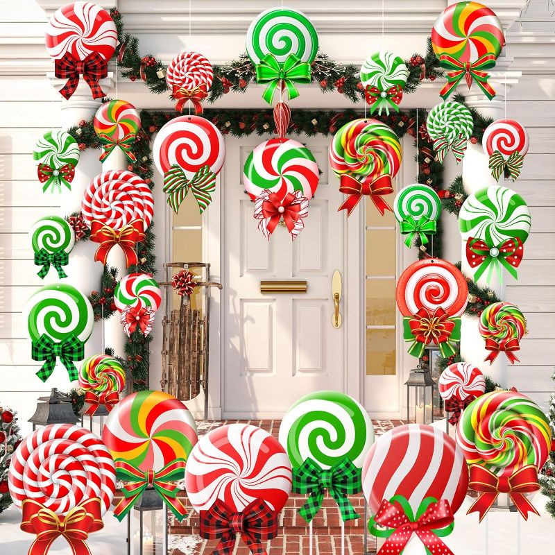 Photo 1 of Huwena 30 Pcs Christmas Outdoor Hanging Decorations Snowflakes Candy Yard Signs Include 6 Plastic Yard Stakes 24 Double Sided Ornaments for Christmas Winter Holiday Garden Tree Decor(Candy Cane)
