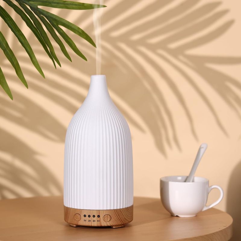 Photo 1 of Coolego Ceramic Diffuser, 100ml Essential Oil Diffuser Ultrasonic Cool Mist Aromatherapy Diffuser with Waterless Auto-Off, 4 Timer Setting & 7 Colors Night Light for Home Office, White

