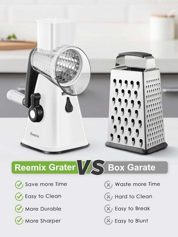 Photo 2 of Cheese Grater, Reemix rotary cheese grater with handle, Kitchen Mandoline Vegetable Slicer with 3 Replaceable Stainless Steel Blades, for Nuts, Vegetable, Chocolate, Chesse (White)
