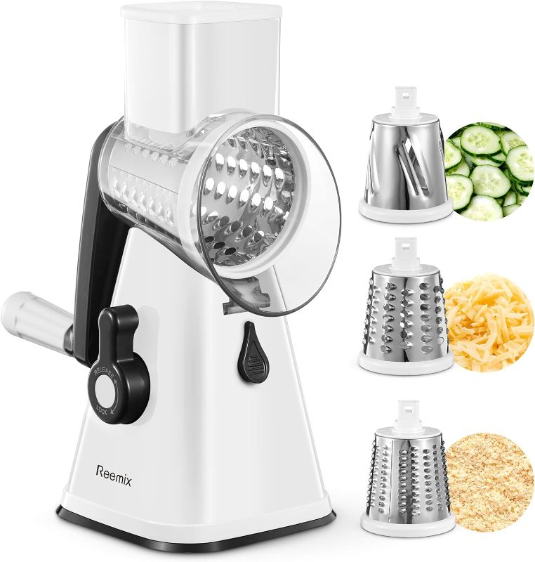Photo 1 of Cheese Grater, Reemix rotary cheese grater with handle, Kitchen Mandoline Vegetable Slicer with 3 Replaceable Stainless Steel Blades, for Nuts, Vegetable, Chocolate, Chesse (White)
