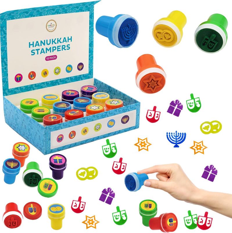 Photo 1 of Hanukkah Stamps, Box of Twelve Multicolored Hanukkah Stampers Each Stamp Includes A Fun Chanukkah Icon Including Menorah, Dreidels and Coins, 12-Pack Box (Single)
