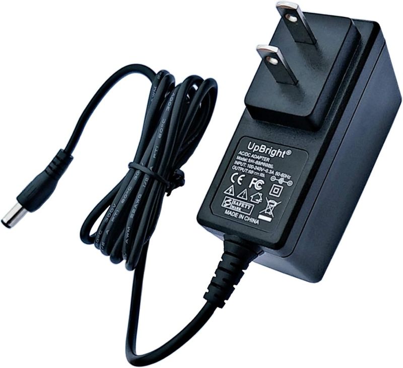 Photo 1 of UpBright 12V AC/DC Adapter Compatible with Brother P-Touch D410 PT-D410 PT-D410VP D460BT PT-D460BT Label Maker Printer ADE001A AD-E001A US UU324-1220 2A DC in 12V Power Supply Battery Charger
