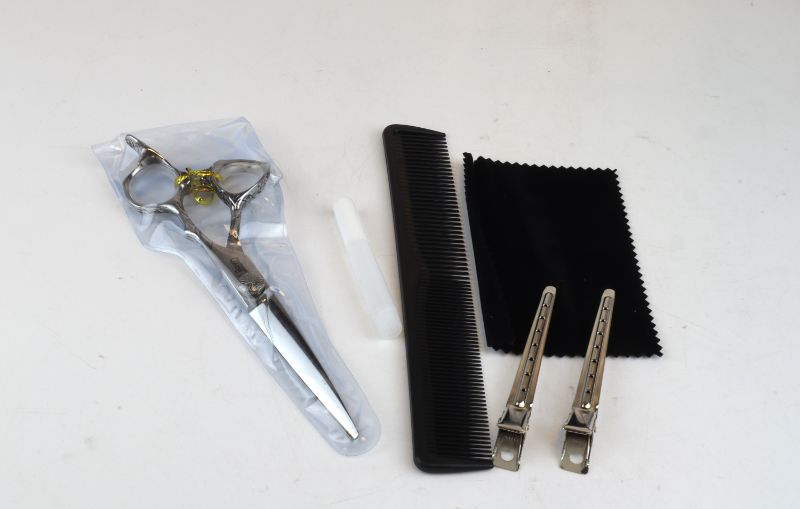 Photo 2 of Japanese Shears With 1 Oil, 1 Comb, 1 Cloth, 2 Clips, and Case New