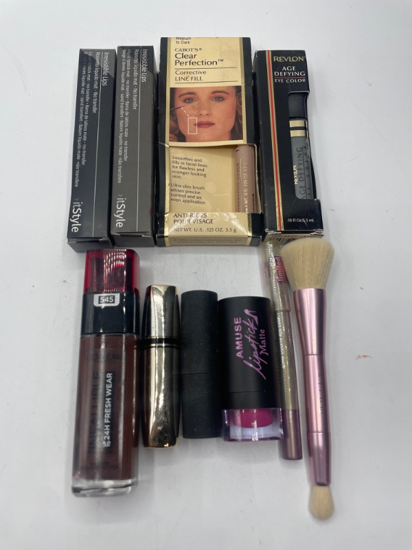 Photo 1 of Miscellaneous variety makeup brand Name cosmetics including ( Cabot's, Amuse ,Revlon ,It Style & DISCONTINUED MAKEUP ITEMS)
