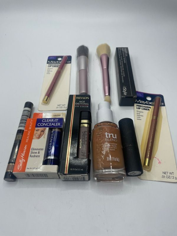 Photo 2 of Miscellaneous variety makeup brand Name cosmetics including ( Maybelline ,True Blend, Revlon ,It Style, Sally Hansen & DISCONTINUED MAKEUP ITEMS)