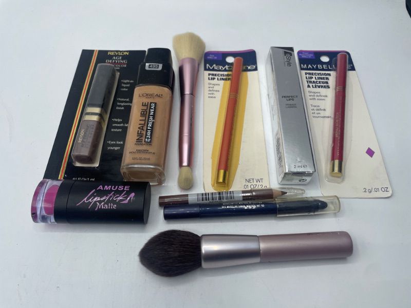 Photo 1 of Miscellaneous variety makeup brand Name cosmetics including ( Maybelline , Revlon ,It Style, AMUSE& DISCONTINUED MAKEUP ITEMS)