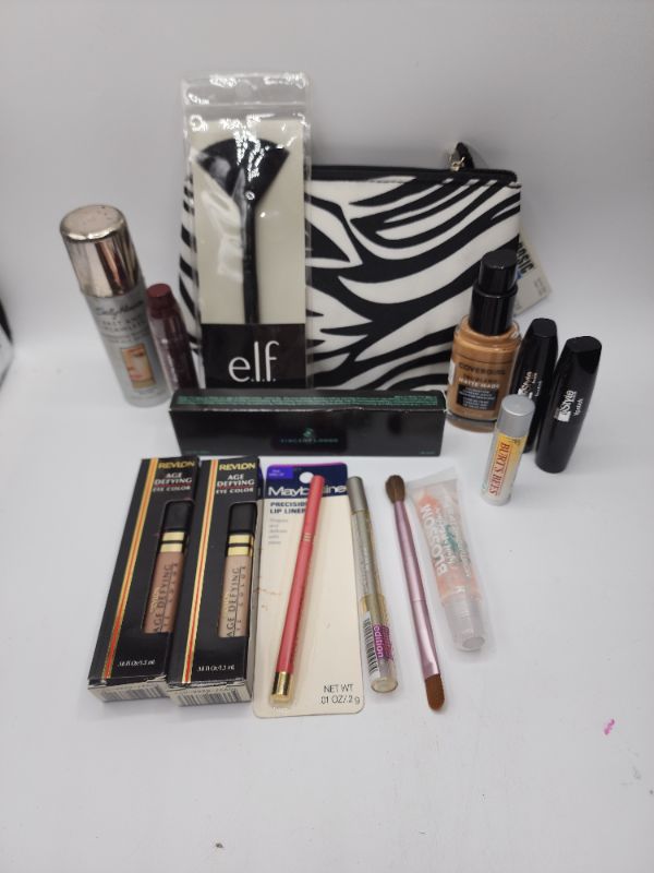 Photo 1 of Miscellaneous Variety Brand Name Cosmetics Including ((Sally Hanson, Elf, Revlon, Maybelline, Blossom, Burts Bees, ItStyle))  Including Discontinued Makeup Products
