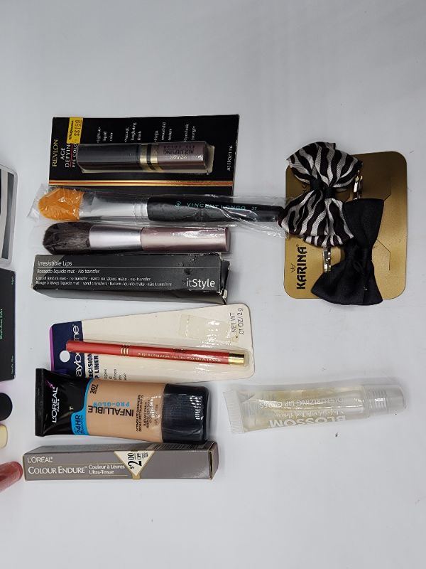 Photo 2 of Miscellaneous Variety Brand Name Cosmetics Including (( Revlon, Elf, Blossom, Sally Hansen, Loreal, Itstyle, Vincent Longo, Mally)) Including Discontinued Makeup Products 