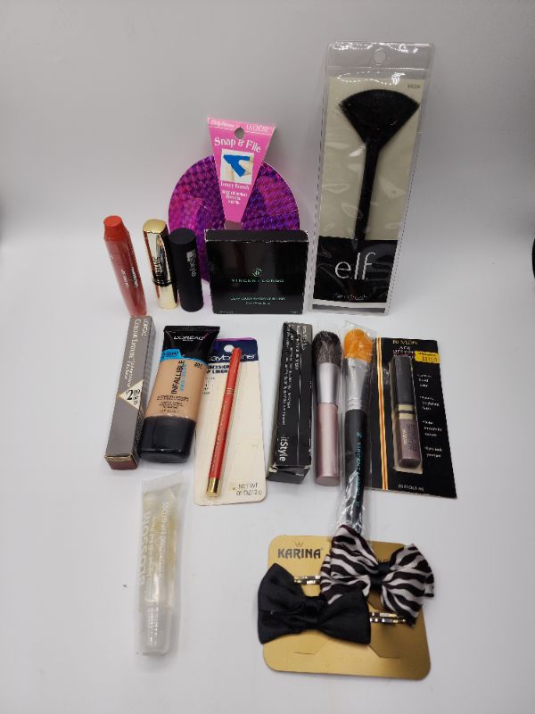 Photo 1 of Miscellaneous Variety Brand Name Cosmetics Including (( Revlon, Elf, Blossom, Sally Hansen, Loreal, Itstyle, Vincent Longo, Mally)) Including Discontinued Makeup Products 