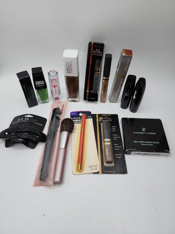 Photo 1 of Miscellaneous Variety Brand Name Cosmetics Including (( Revlon, Elf, Blossom, Sally Hansen, Loreal, Itstyle, Vincent Longo, Mally)) Including Discontinued Makeup Products 