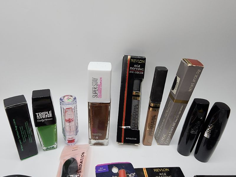 Photo 3 of Miscellaneous Variety Brand Name Cosmetics Including (( Revlon, Elf, Blossom, Sally Hansen, Loreal, Itstyle, Vincent Longo, Mally)) Including Discontinued Makeup Products 