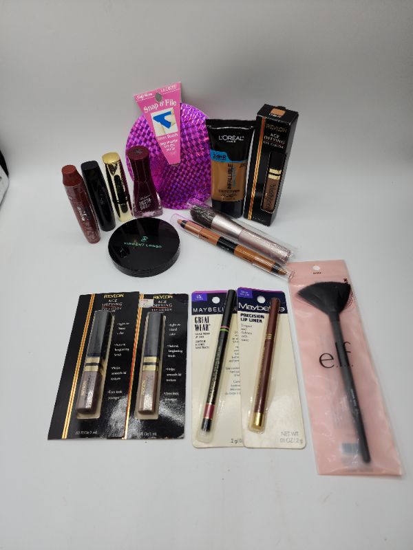 Photo 1 of Miscellaneous Variety Brand Name Cosmetics Including (( Revlon, Elf, Sally Hansen, Loreal, Itstyle, Vincent Longo)) Including Discontinued Makeup Products 