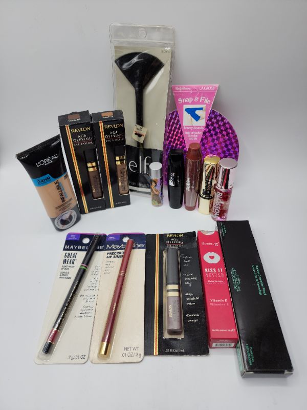 Photo 1 of Miscellaneous Variety Brand Name Cosmetics Including (( Revlon, Elf, Blossom, Sally Hansen, Loreal, Itstyle, Vincent Longo, Mally, Crème Shop)) Including Discontinued Makeup Products 