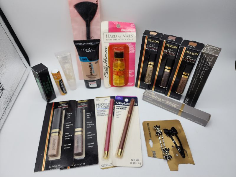 Photo 1 of Miscellaneous Variety Brand Name Cosmetics Including (( Revlon, Elf, Blossom, Sally Hansen, Loreal, Itstyle, Vincent Longo, Mally, Maybelline, Chapstick)) Including Discontinued Makeup Products 