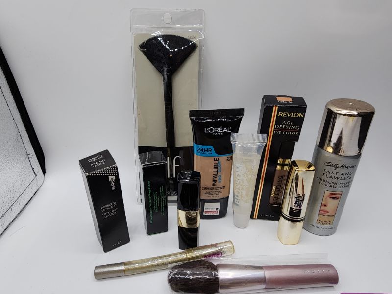 Photo 3 of Miscellaneous Variety Brand Name Cosmetics Including (( Revlon, Elf, Blossom, Sally Hansen, Loreal, Itstyle, Vincent Longo, Mally, Maybelline)) Including Discontinued Makeup Products 