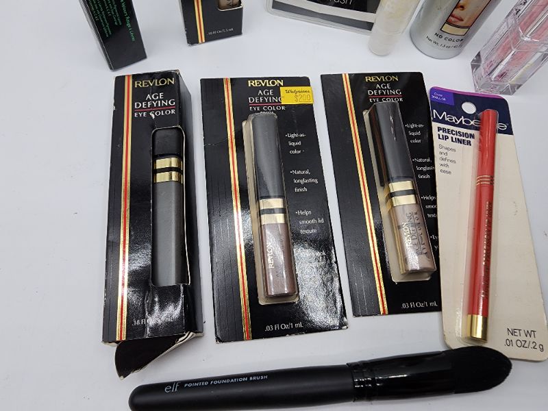 Photo 1 of Miscellaneous Variety Brand Name Cosmetics Including (( Revlon, Elf, Blossom, Sally Hansen, Loreal, Vincent Longo, Mally, Maybelline)) Including Discontinued Makeup Products 