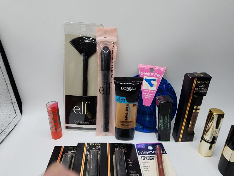 Photo 3 of Miscellaneous Variety Brand Name Cosmetics Including (( Revlon, Elf, Blossom, Sally Hansen, Loreal, Itstyle, Vincent Longo, Mally, Maybelline)) Including Discontinued Makeup Products 